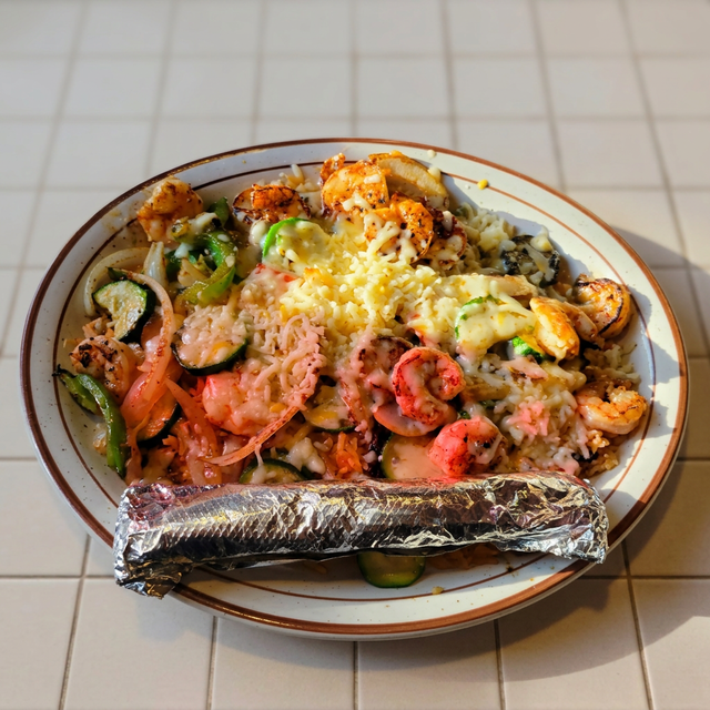 Steak and Shrimp with Rice (Arroz con Camarón y Carne Asada).